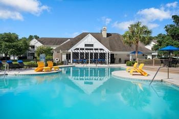 Sparkling swimming pool with sun deck
